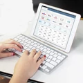 Exkluzív slim bluetooth billentyűzet Android, iOS, Windows támogatással