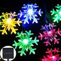 Napelemes színes LED fényfüzér hópehely formákkal, 8 program, 30 LED, 6,5 méter Napelemes színes LED fényfüzér hópehely formákkal, 8 program, 30 LED, 6,5 méter
