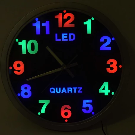 Fémkeretes analóg quartz falióra színes LED számlappal, 25.5 cm